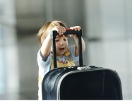 baby-pushing-suitcase-cropped