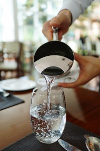 water being poured from a pitcher