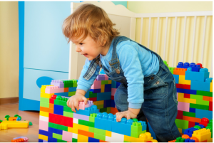 baby playing with Legos