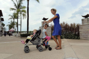 two kids in a stroller