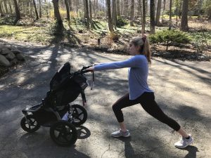 woman lunging with a jogging stroller