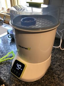 Gourmia bottle sterilizer and dryer on a kitchen counter