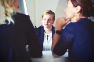 woman in business meeting new baby